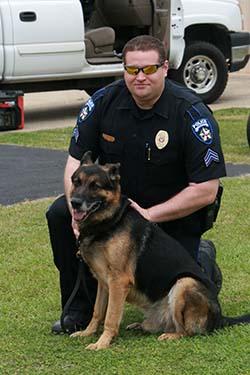Center Police Sgt. Scott Burkhalter is seen above with K9 Officer Zitan who will soon be retiring. It was announced at the Center City Council meeting that a new K9 has recently been donated to the Center Police Department and following his retirement, Zitan will remain with Sgt. Burkhalter and his family.