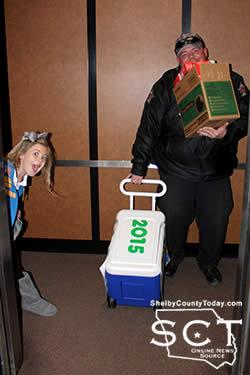 Girl Scout Ella Matthews delivering cookies with the help of her dad. She is the daughter of Jim Ed and Jennifer Matthews.