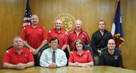 SISD School Board Members pictured are: (Front row, L to R) Tim Bradshaw, 2 years; Dr. Ray West, Superintendent; Etola Jones, President, 7 years; Mark Bohannon, Vice-President, 2 years; (back row, L to R); Joey Lawson, Secretary, 3 years; Duane Lout, 4 years; Joe Tom Schillings, 7 years; and Kelly Parker, 9 years.