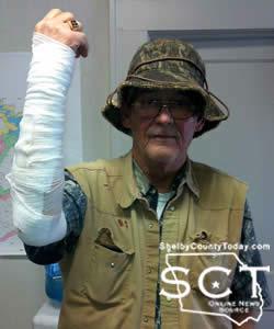 Jerry Green shows his arm which was injured during the attack.