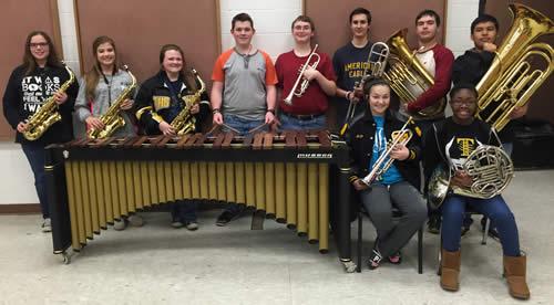 Top Picture: State Qualifiers (from left) Alto Saxophone Trio: Kendall Archer, Brittany Hutto, and Bethany Lindgren; Marimba Soloist: Connor Timmons; Brass Sextet: Dallas Dennis, Devin Kimzey, Marc Carroll, Fabian Martinez; (seated) Madelyn Ramsey, Ke’Unnia Perkins.