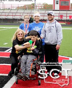 Timpson Special Olympians and coaches