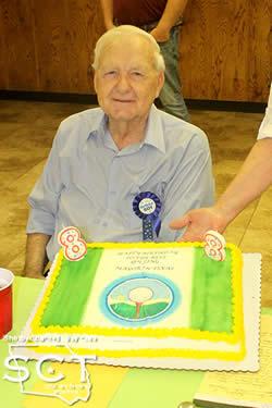 George Bowers was presented with a cake during the meeting recognizing his 88th birthday.