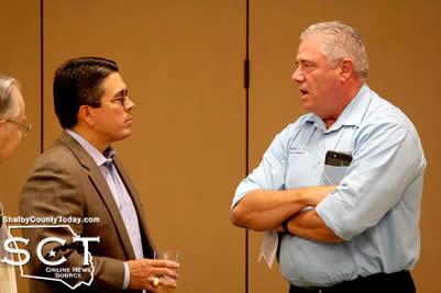 Rep. Chris Paddie (left) speaking with Dr. Mike Belgard, CEO of the Hope Project.