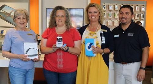 Door Prize Winners: (from left) Billie Sue Payne, J.J. Ford, Lorei Choate, and Store Manager Gabriel Rebollar