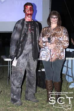 Jack Bryant (left), adult costume competition winner was awarded by Tracy Lee (right).