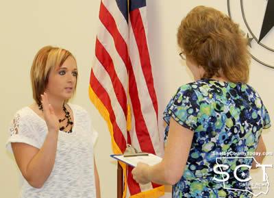 Elizabeth Swint (left) is seen taking the oath of her office as Tenaha Municipal Court Judge while Sheryl Clark (right), Tenaha City Secretary, administered the oath.