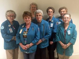 Auxiliary members include, from left, Betty Rodgers, Linda Albers, Ellen Stokes, Joy Cariker, Bobbie Cariker, Marge Wilkerson and Peggy Fuller.