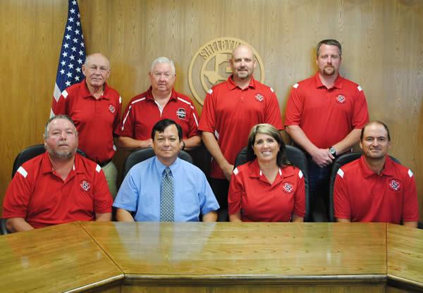 SISD School Board Members pictured are:  (front row, from left) Tim Bradshaw, 3 years; Dr. Ray West, Superintendent; Etola Jones, President, 8 years; Mark Bohannon, Vice-President, 3 years; (back row, from left); Duane Lout , 5 years; Joe Tom Schillings, 8 years; Joey Lawson, Secretary 4 years; and Chris Koltonski, 1 year.
