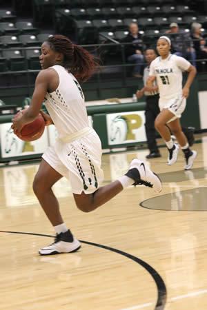 Freshman Patience Okpe goes for 16 and Sophomore Genesis Rivera (21) goes for 16 as well. Photo courtesy of Theresa Beasley.