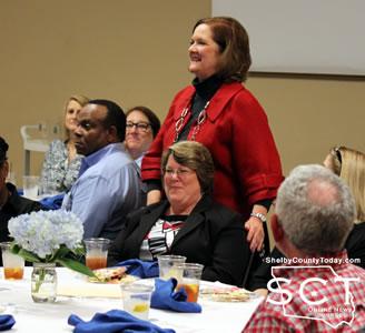 (Red jacket) Chamber of Commerce Executive Director Pam Phelps
