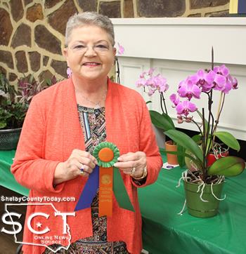 Peggy Buddin, Growers’ Choice Award and Horticultural Excellence Award for her orchids