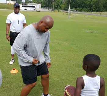John Preston (foreground) shows some moves to Preston campers while Ronnie Williams waits his turn.