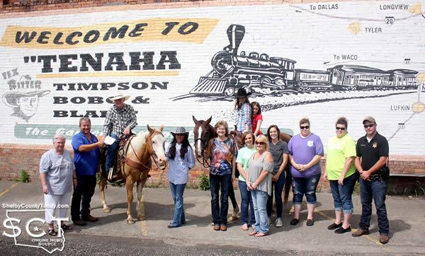 Several Tenaha City representatives, business owners and citizens gathered to greet the pony express when they arrived in Tenaha. Pictured are (from left): Marilyn Corder, Timpson Area Chamber of Commerce Representative; Carl Jernigan, Tenaha Mayor; Danny Dixon on Jalapeño "Pepper" the horse; Rose Dixon; Sheryl R. Clark, City Secretary; Elizabeth Swint; Municipal Court Judge; Sarah Dixon and Delayna Higginbotham on "Floyd" the horse; Vickie Jernigan, Community Planning and Events Coordinator; Allison Rhone; Becky Raybon; Linda Raybon; and Jake Metcalf, Precinct 4 Constable.