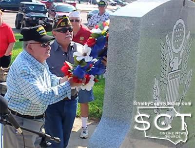 A.J. Procell places the VJ Day Memorial Wreath assisted by Newton Johnson, VFW Post Senior Vice.