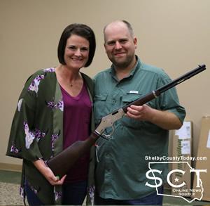 Dr. Mark Jousan and wife, Kristin won the winning bid on the Jacob Hughes Memorial Gun.