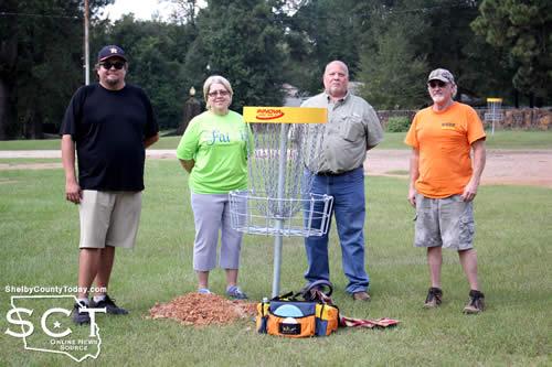 Pictured are (from left) Kyle Allen; Debra Smith, Timpson mayor; Paul Smith, Timpson Area Chamber of Commerce President; and Craig Lewis, Disc Golf course designer.