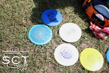 Craig Lewis displayed several discs he has acquired over the years from different disc golf tournaments.
