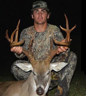 Nacogdoches County archer Jake Crisp brought down his big 14 pointer on 130 acres of open range on Oct. 7. The non-typical rack has been rough scored at 156 7/8. (Courtesy Photo)