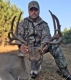Nacogdoches County hunter Johnny Cole shot this tall-tined 11 pointer while hunting behind high fence on Oct. 18. The big non-typical grosses 164 and nets 161 6/8. (Courtesy Photo)