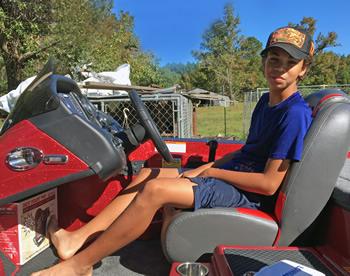 The 12-year-old angler topped a field of nearly 800 anglers and won a fully rigged Triton bass boat (pictured here) and $6,000 in cash. (Courtesy Photos)