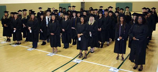Students at the first ceremony line up in preparation for the processional into the Arthur Johnson Gymnasium