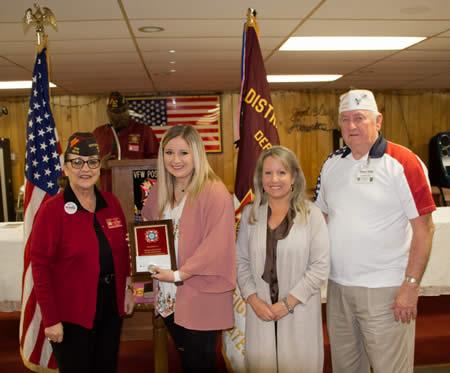 (Photo L-R, State Senior Vice Commander Inge Conley who made the presentation, Abigale, her mother Whitney and VFW Post 8904 Commander Gene Hutto)