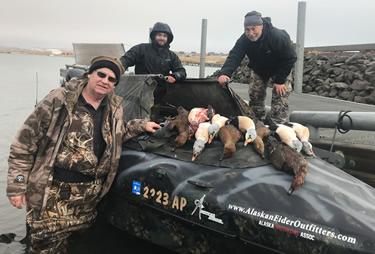 Tim Boatman (right) and Andrew Boatman (center) recently traveled to the Bering Sea off the coast of Alaska to hunt King Eider, arguably the most sought after sea duck in the world. (Courtesy Photo)