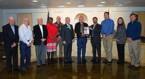 David Zatopek presented the Design Excellence award to the Panola College Board of Trustees.