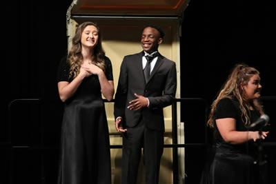 Panola Pipers Sydnee Taylor, Funminiyi Alabi and Shannon James sing “Love Will Keep Us Together.”