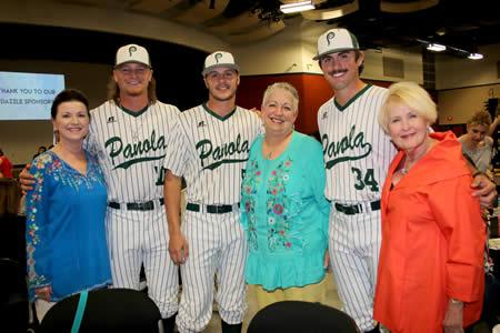 Tresa Joffrion, Toni Biggs, and Wanda Hanszen pose for a quick picture with the Panola College Baseball players at the beginning of the night.