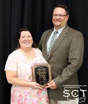 Past-President Meg Camp receives recognition from current Chairperson Brian Wages