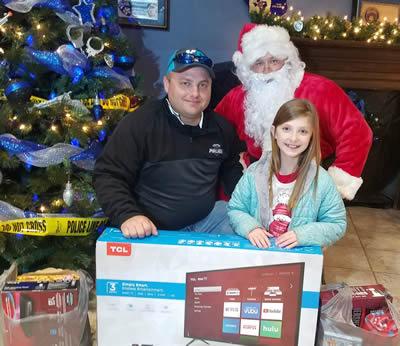 Carmella King was the winner of the toy drive raffle.