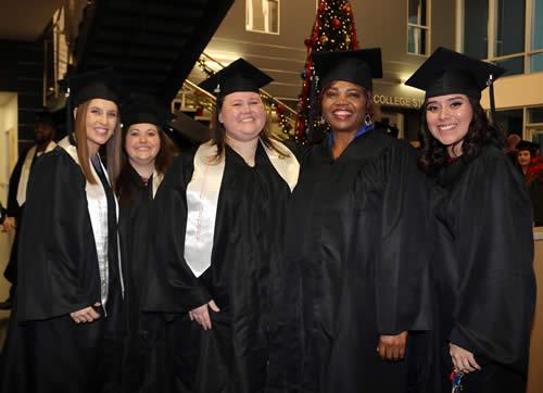 Students gathered in the foyer of the Charles C. Matthews Foundation Student Center before commencement.