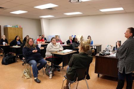 Anne Stacy-Robbins discusses Music and Memory with Shelby College Center Certified Nurse Aide students at Panola College.