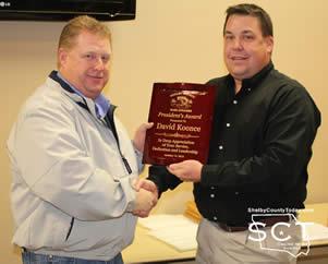 David Koonce (left) was presented with the President's Award by Jason Wells (right). The honor was in recognition of Koonce's service, dedication and leadership