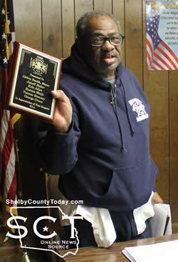 Councilman George Grace (pictured) displayed plaques of support and appreciation which were presented to the council by the Timpson Volunteer Fire Department.