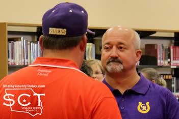 Barry Bowman (right), Center ISD Athletic Director and Head Coach, is seen speaking with Jason Mitchell (left) during the meet and greet event Thursday, July 16, 2015.