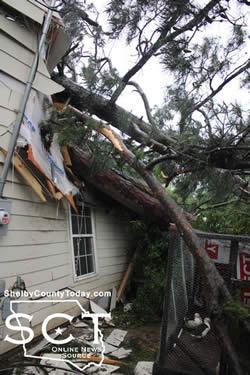 Thankfully one couple was awake when the storm rolled through Center on the 11th of May and ran for safety as a large tree fell into the house they were renting on Houston Street during the early morning hours.