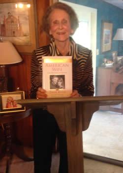 Mrs. Watson holding her book