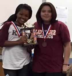 Kamari Gray and Kelly Sandoval proudly showing off the team trophy!