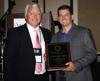 Texas Department of Public Safety State Trooper Dustin Ramos (right) is seen receiving the Officer of the Year Award. Presenting the award is DPSOA Board Member and Conference Chair, Wayne Williams (left) of Port Aransas, TX (Photo submitted by John M. Pike, CAE Executive Director Texas DPS Officer Association).