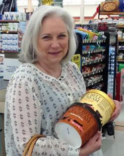 Catherine Duvon (Pictured above) was the first Blue Bell Ice Cream customer of the day at the Center location on Monday, December 14, 2015.