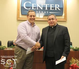 Nehring presents check to Fr. Jose Vidarte, St. Therese Catholic Church Church Category, 1st Place