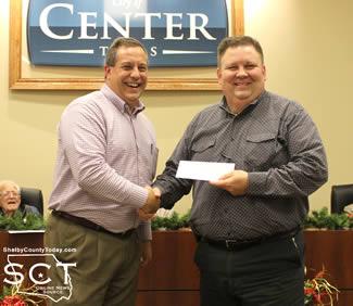 Nehring presents check to David Hailey, Brookshire Brothers - Business Category, 2nd Place     