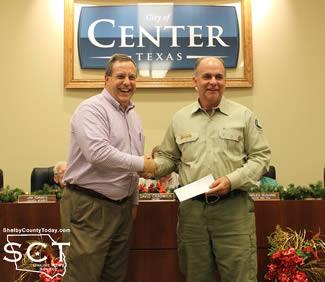 Nehring presents check to Del Birdwell, Texas A&M Forest Service - Business Category, 3rd Place