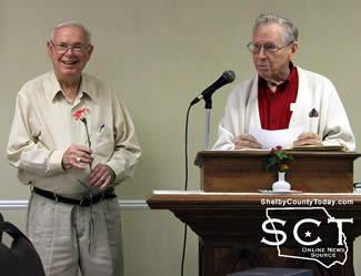 (Right) Bro. Carl Smith installs new officers including Joe Anderson (left) as President.