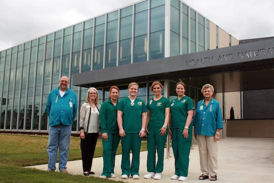 From left, Lynn Getsay, ETMC Carthage Auxiliary; Dr. Barbara Cordell, Dean of Nursing and Health Sciences; Lora Gonzalez of Carthage; Meagan Tillman of Beckville; Holly Royer of Timpson; Jacqueline Bridges of Henderson, and Marge Wilkerson, EMTC Carthage Auxiliary.