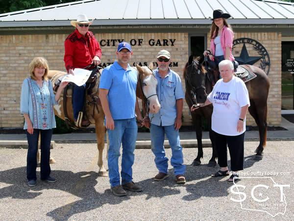 Pictured are (from left):  Pam Woodfin, Gary City Secretary; Danny Dixon on "Pepper," Cody Pierce, John Patty, Sarah Dixon on "Gypsy," and Marilyn Corder. 