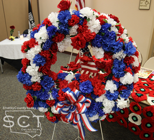 Roll Call of Honor Memorial Wreath with 231 names remembered. The bow represents those unknown.